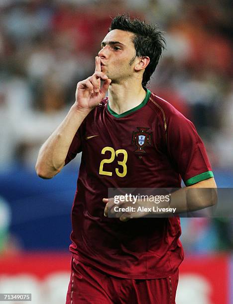 Helder Postiga of Portugal gestures following his team's victory at the end of the FIFA World Cup Germany 2006 Quarter-final match between England...