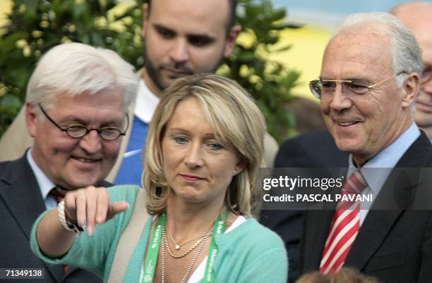 Frankfurt am Main, GERMANY: Heidrun , the wife of World Cup 2006 organising committee chief Franz Beckenbauer gestures as German Foreign Minister...