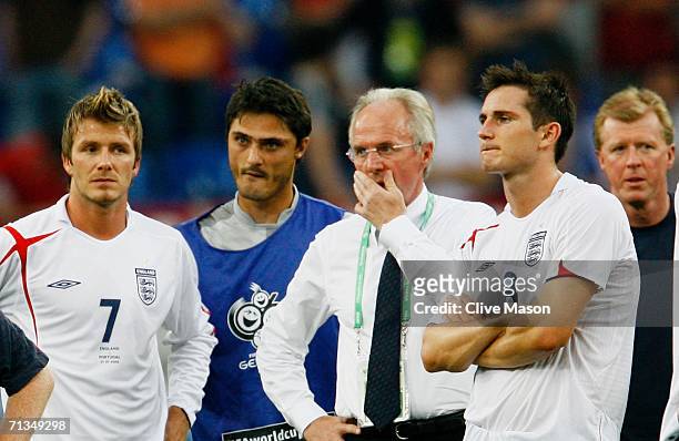 Manager of England Sven Goran Eriksson, David Beckham and Frank Lampard of England look dejected following their team's defeat in a penalty shootout...