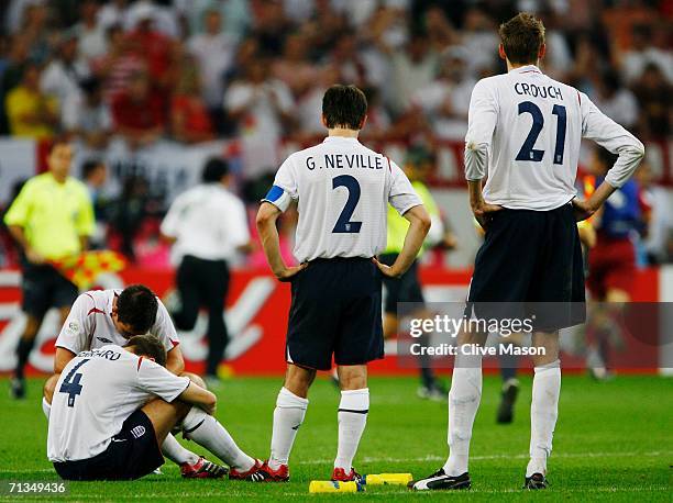 Frank Lampard and Steven Gerrard of England look dejected following their team's defeat in a penalty shootout at the end of the FIFA World Cup...