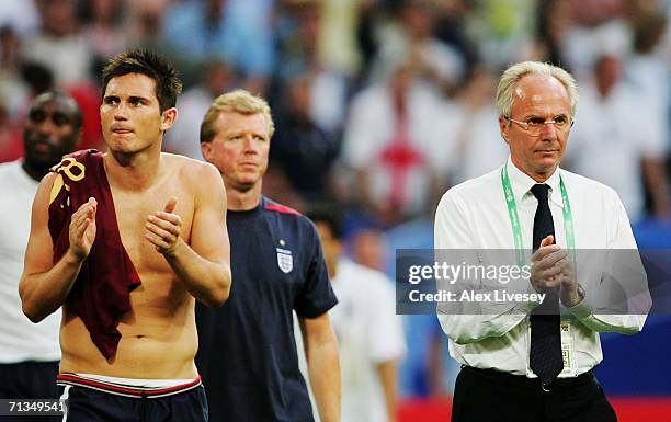 Frank Lampard of England and Manager Sven Goran Eriksson applaud the fans following defeat in the FIFA World Cup Germany 2006 Quarter-final match...