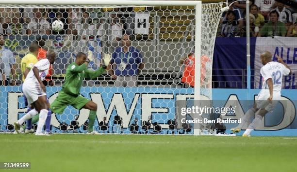 Thierry Henry of France scores the opening goal during the FIFA World Cup Germany 2006 Quarter-final match between Brazil and France at the Stadium...