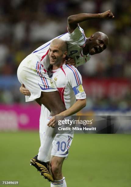 Patrick Vieira and Zinedine Zidane of France celebrate, after teammate Thierry Henry scores the opening goal during the FIFA World Cup Germany 2006...