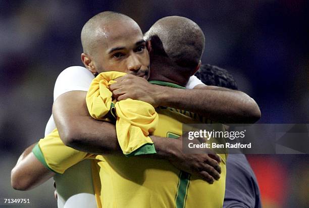 Thierry Henry of France hugs Adriano of Brazil, following his team's 1-0 victory during the FIFA World Cup Germany 2006 Quarter-final match between...