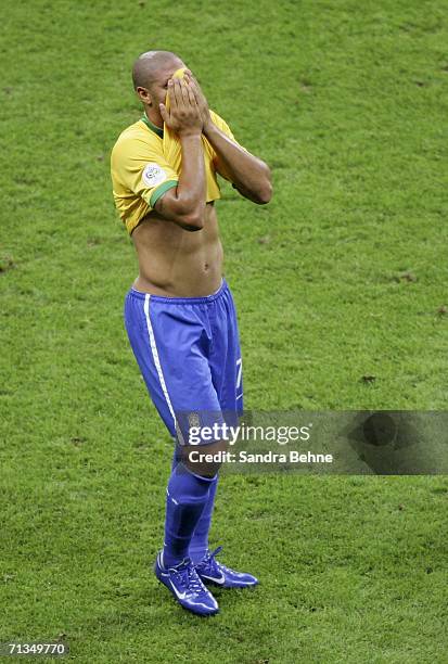 Dejected Adriano of Brazil leaves the pitch the pitch following his team's 1-0 defeat and exit from the competition during the FIFA World Cup Germany...