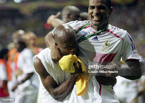 French teamates Lilian Thuram and Florent Malouda, celebrate their team's 1-0 victory during the FIFA World Cup Germany 2006 Quarter-final match...