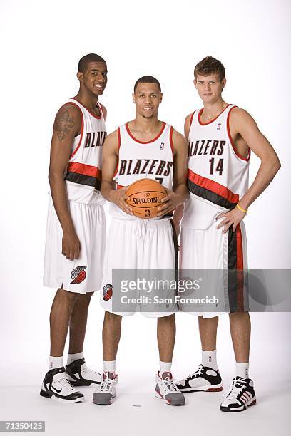 Draft selections LaMarcus Aldridge and Brandon Roy, both acquired by the Portland Trail Blazers, pose for a photo with the 30th overall draft pick,...