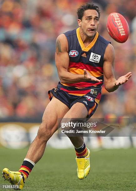 Andrew McLeod of the Crows marks the ball during the round 13 AFL match between the Adelaide Crows and the Geelong at AAMI Stadium on July 2, 2006 in...