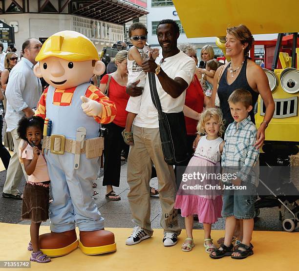 Former sprinter Linford Christie poses for photographs with his family at the Bob The Builder - Built To Be Wild UK Premiere at the Odeon West End in...