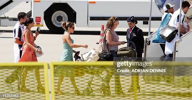 English national football team players Frank Lampard and Aaron Lennon board a British Airways jet followed by their wife and girlfriend at Baden...