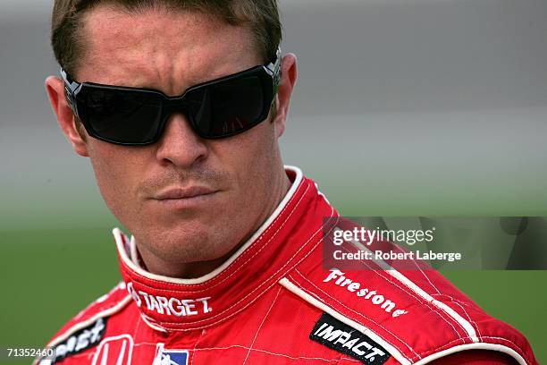 Scott Dixon, driver of the Target Chip Ganassi Racing Dallara Honda, looks on before warming up for the IRL IndyCar Series Kansas Lottery Indy 300 on...