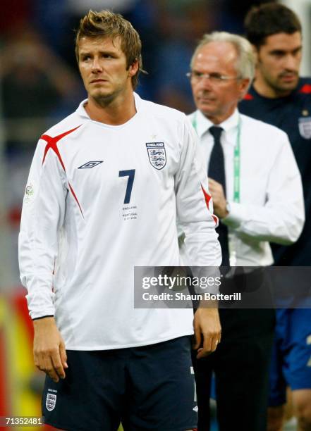 David Beckham and Sven Goran Eriksson look dejected following defeat during the FIFA World Cup Germany 2006 Quarter-final match between England and...