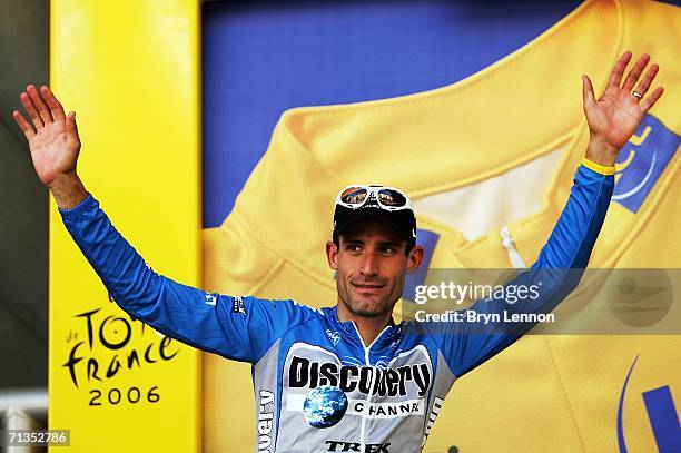 George Hincapie of the USA and the Discovery Channel team celebrates taking the yellow jersey after the first stage of the 2006 Tour de France from...