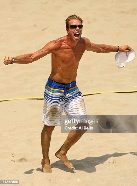 Casey Jennings celebrates a semi final win against Phil Dalhausser and Todd Rogers during the AVP Seaside Heights Open on July 2, 2006 in Seaside...