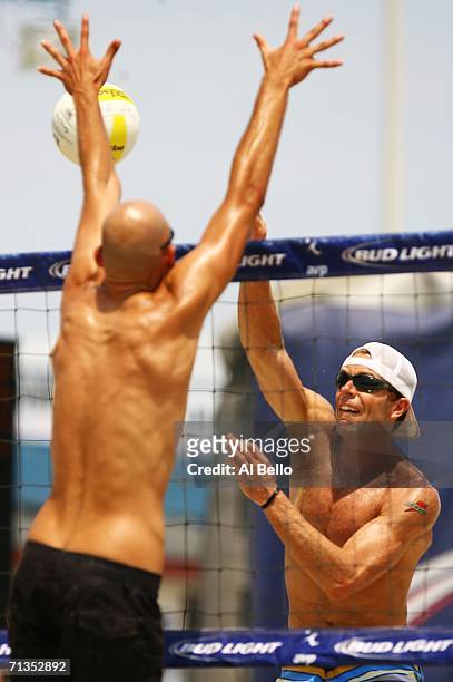 Casey Jennings spikes the ball against Phil Dalhausser during the AVP Seaside Heights Open on July 2, 2006 in Seaside Heights, New Jersey.
