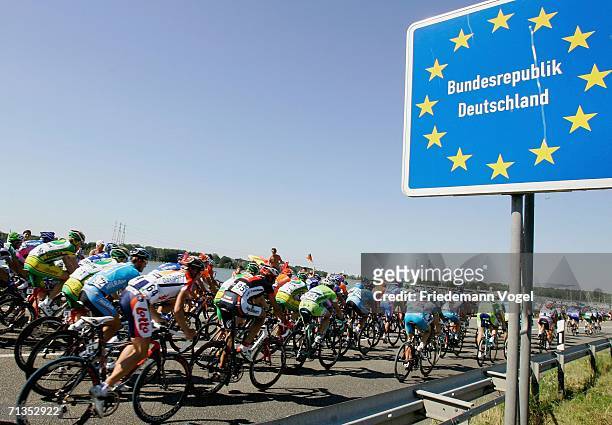 The pack cross the border to Germany during Stage 1 of the 93rd Tour de France between Strasbourg and Strasbourg on July 2, 2006 in Strasbourg,...