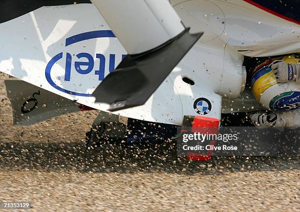 Nick Heidfeld of Germany and BMW Sauber flips upside down on the first lap of the Formula One United States Grand Prix at Indianapolis Motor Speedway...