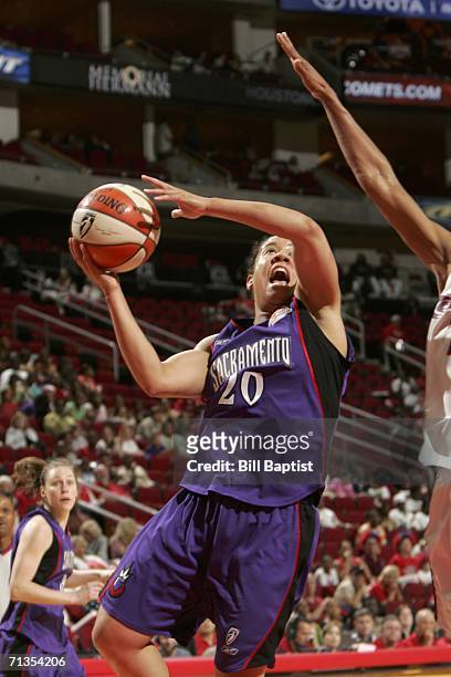 Kara Lawson of the Sacramento Monarchs shoots against the Houston Comets during the WNBA game July 2, 2006 at the Toyota Center in Houston, Texas....