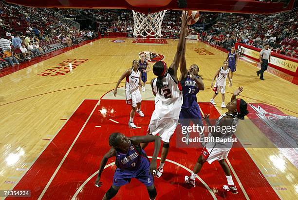 Michelle Snow of the Houston Comets blocks a shot by Yolanda Griffith of the Sacramento Monarchs during the WNBA game July 2, 2006 at the Toyota...