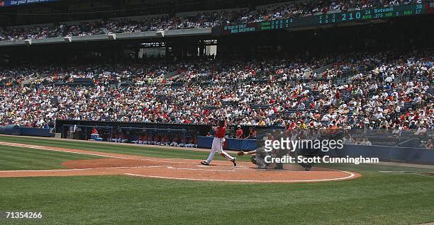 Wilson Betemit of the Atlanta Braves hits a solo home run in the 5th inning against the Baltimore Orioles at Turner Field on July 2, 2006 in Atlanta,...