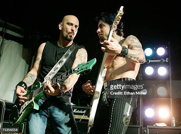 Velvet Revolver guitarist Dave Kushner performs with Camp Freddy guitarist Dave Navarro during the unveiling of the USD 40 million pool opening and...