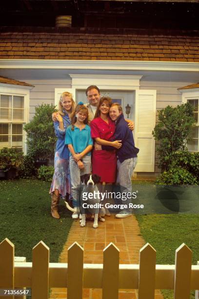 The cast of the TV series "Life Goes On," Monique Lanier, Bill Smitrovich, Kellie Martin , Patti LuPone, and Chris Burke, pose for a group photo...