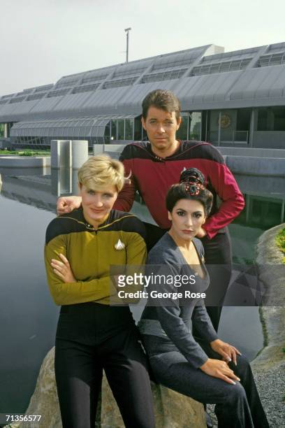 Jonathan Frakes , Denise Crosby and Marina Sirtis, stars of TV's Star Trek-The Next Generation, pose for a group photo during a 1987 North Hollywood,...
