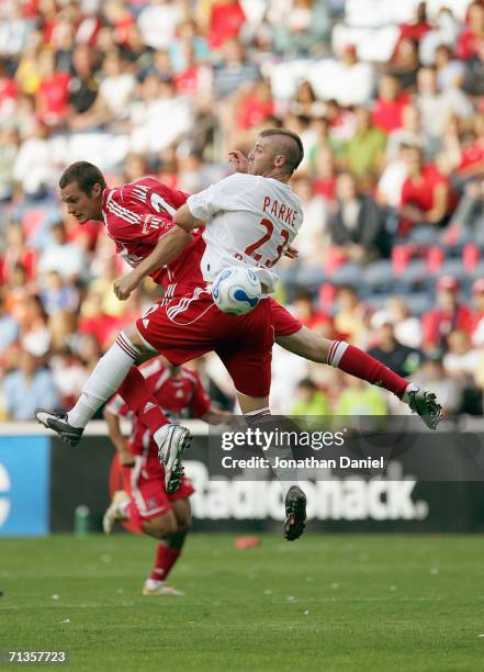 Nate Jaqua of the Chicago Fire beats Jeff Parke of the New York Red Bulls to a header on June 25, 2006 at Toyota Park in Bridgeview, Illinois. The...