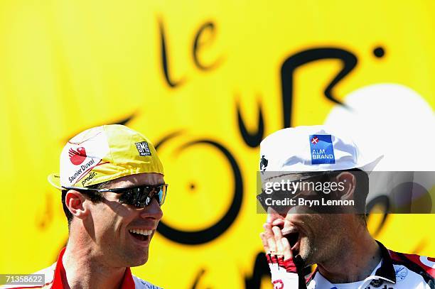 David Millar of Great Britain and Saunier Duval shares a joke with Bobby Jullich of the USA and Team CSC prior to the start of stage 2 of the 93rd...