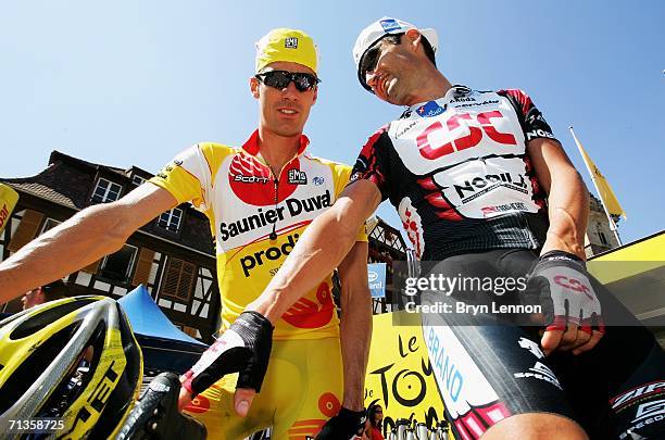 David Millar of Great Britain and Saunier Duval shares a joke with Bobby Jullich of the USA and Team CSC prior to the start of stage 2 of the 93rd...