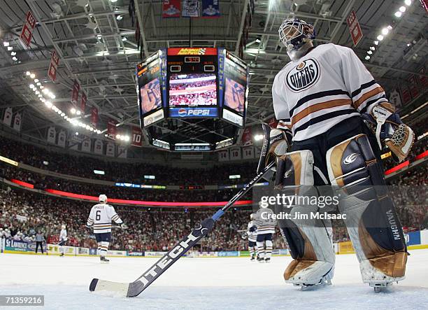 Goaltender Jussi Markkanen of the Edmonton Oilers skates back into position after giving up a goal to the Carolina Hurricanes during game five of the...