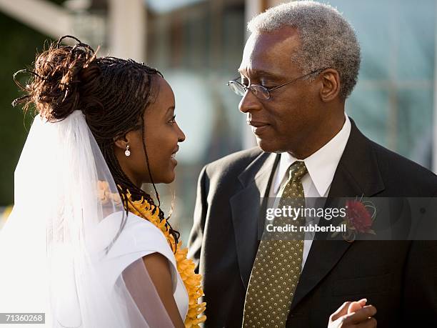 close-up of a father dancing with his daughter at her wedding - bride father stock-fotos und bilder