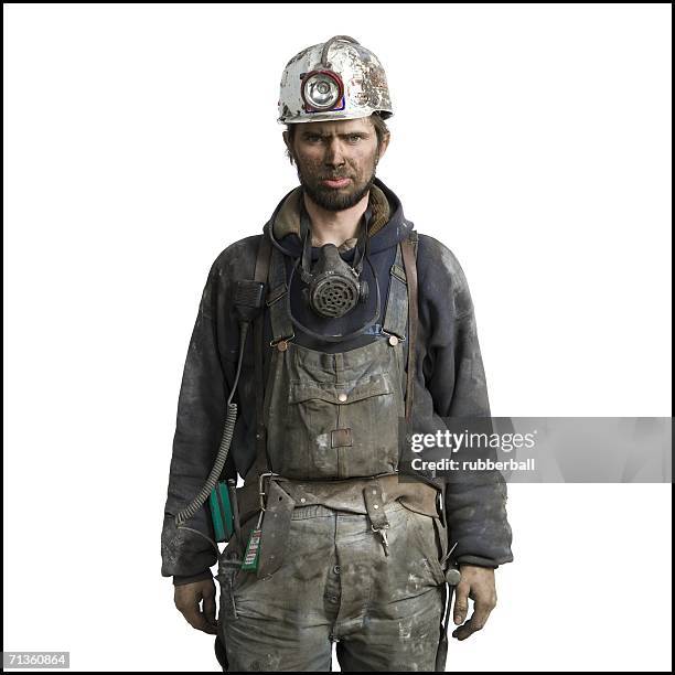 portrait of a miner wearing a hardhat with a headlamp - miner helmet portrait stock pictures, royalty-free photos & images