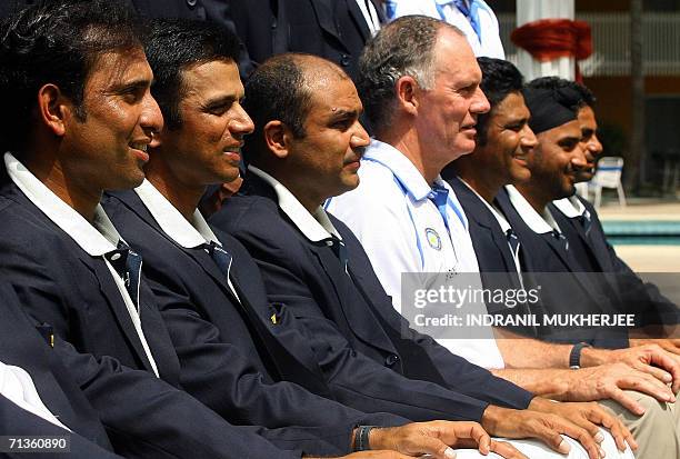 Indian cricketers V.V.S. Laxman, Rahul Dravid, Virender Sehwag, coach Gregg Chappell, Anil Kumble, Harbhajan Singh and Mohammad Kaif pose for a group...