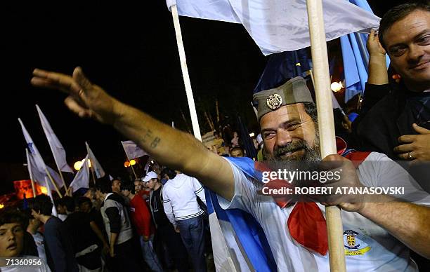 Supporters of Macedonia's ruling party SDSM cheer during the last election rally in Kumanovo, 03 July 2006. Macedonian political parties race for the...