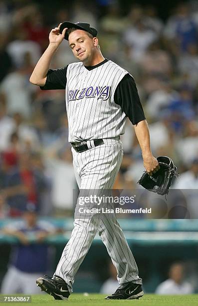 Pitcher Randy Choate of the Arizona Diamondbacks is thrown out of the game in the seventh inning after hitting Nomar Garciaparra of the Los Angeles...