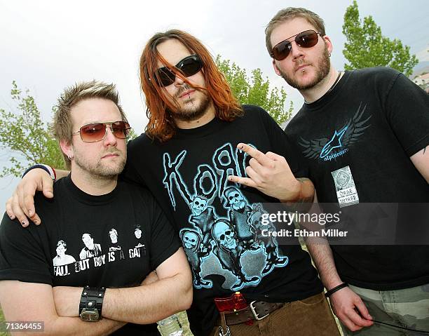 The members of the rock group Seether , drummer John Humphrey, singer/guitarist Shaun Morgan and bassist Dale Stewart, pose backstage before...