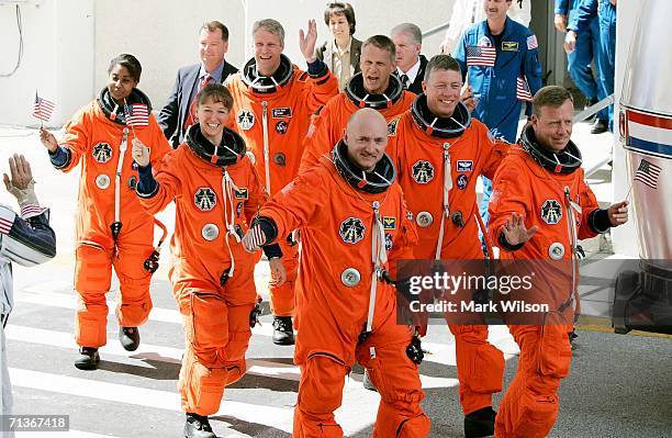 Mission Specialists Stephanie Wilson, Lisa Nowak, Thomas Reiter, a German from the European Space Agency, Pilot Mark Kelly, Mission Specialist Piers...