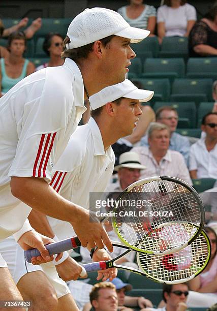 United Kingdom: Bob Bryan and his twin Mike Bryan play their double match against Czech Republic's Lukas Dlouhy and Pavel Vizner on the 3rd round of...