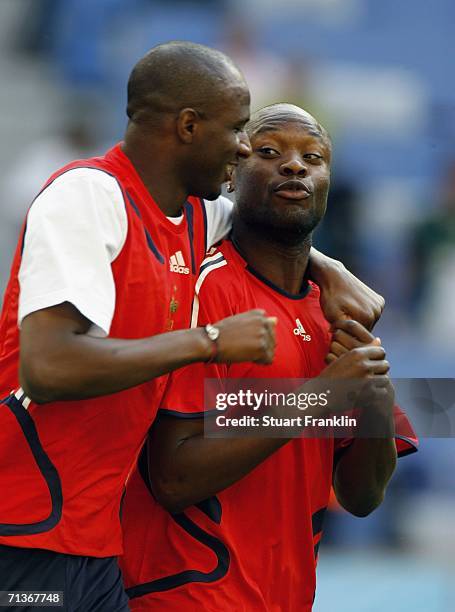 Patrick Vieira and William Gallas of France share a joke during the training session of France National Team at the World Cup stadium on July 4, 2006...