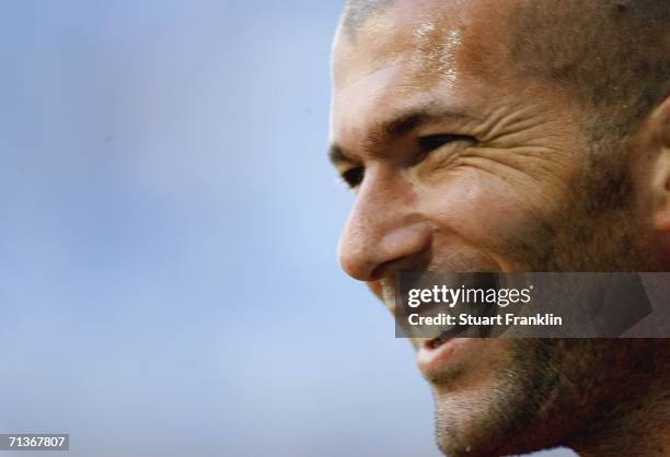Zinedine Zidane of France smiles during the training session of France National Team at the World Cup stadium on July 4, 2006 in Munich, Germany.