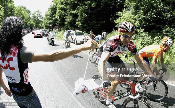 Jens Voigt of Germany and the CSC Team takes a food bag during Stage 3 of the 93rd Tour de France between Esch-sur-Alzette and Valkenburg on July 4,...