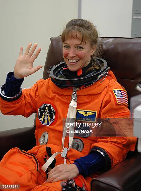 In this handout photo provided by NASA, STS-121 Mission Specialist Lisa Nowak suits up before heading to the launch pad July 4, 2006 at Kennedy Space...