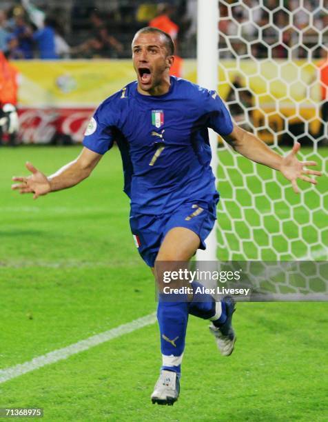 Alessandro Del Piero of Italy celebrates scoring his team's second goal in extra time during the FIFA World Cup Germany 2006 Semi-final match between...