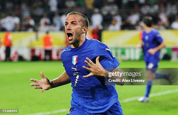 Alessandro Del Piero of Italy celebrates scoring his team's second goal in extra time during the FIFA World Cup Germany 2006 Semi-final match between...