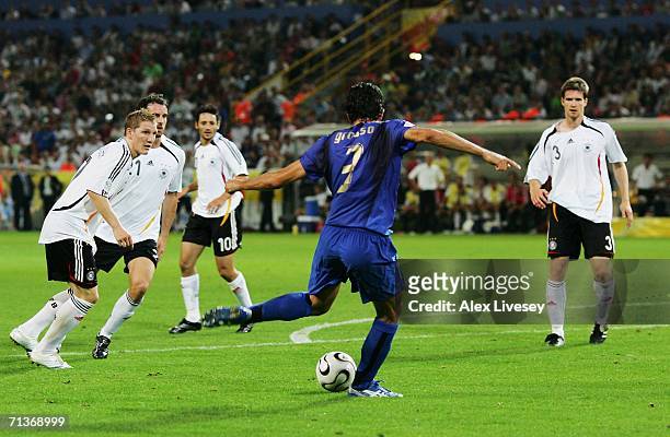 Fabio Grosso of Italy scores his team's first goal in extra time during the FIFA World Cup Germany 2006 Semi-final match between Germany and Italy...