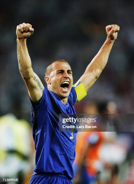 Fabio Cannavaro of Italy celebrates his team's victory at the end of the FIFA World Cup Germany 2006 Semi-final match between Germany and Italy...