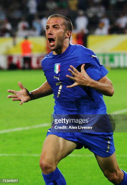 Alessandro Del Piero of Italy celebrates scoring his team's second goal in extra time during the FIFA World Cup Germany 2006 Semi-final match between...