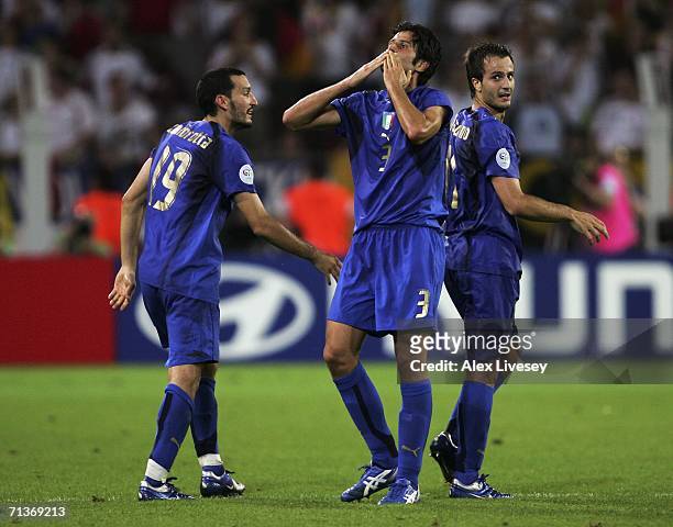 Fabio Grosso of Italy celebrates scoring his team's first goal in extra time during the FIFA World Cup Germany 2006 Semi-final match between Germany...