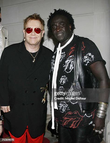 Elton John and designer Moko attend the 'Chrome Heart' party at Baccarat Mansion after the opening of the 1st Chrome Heart shop on Avenue Montaigne...
